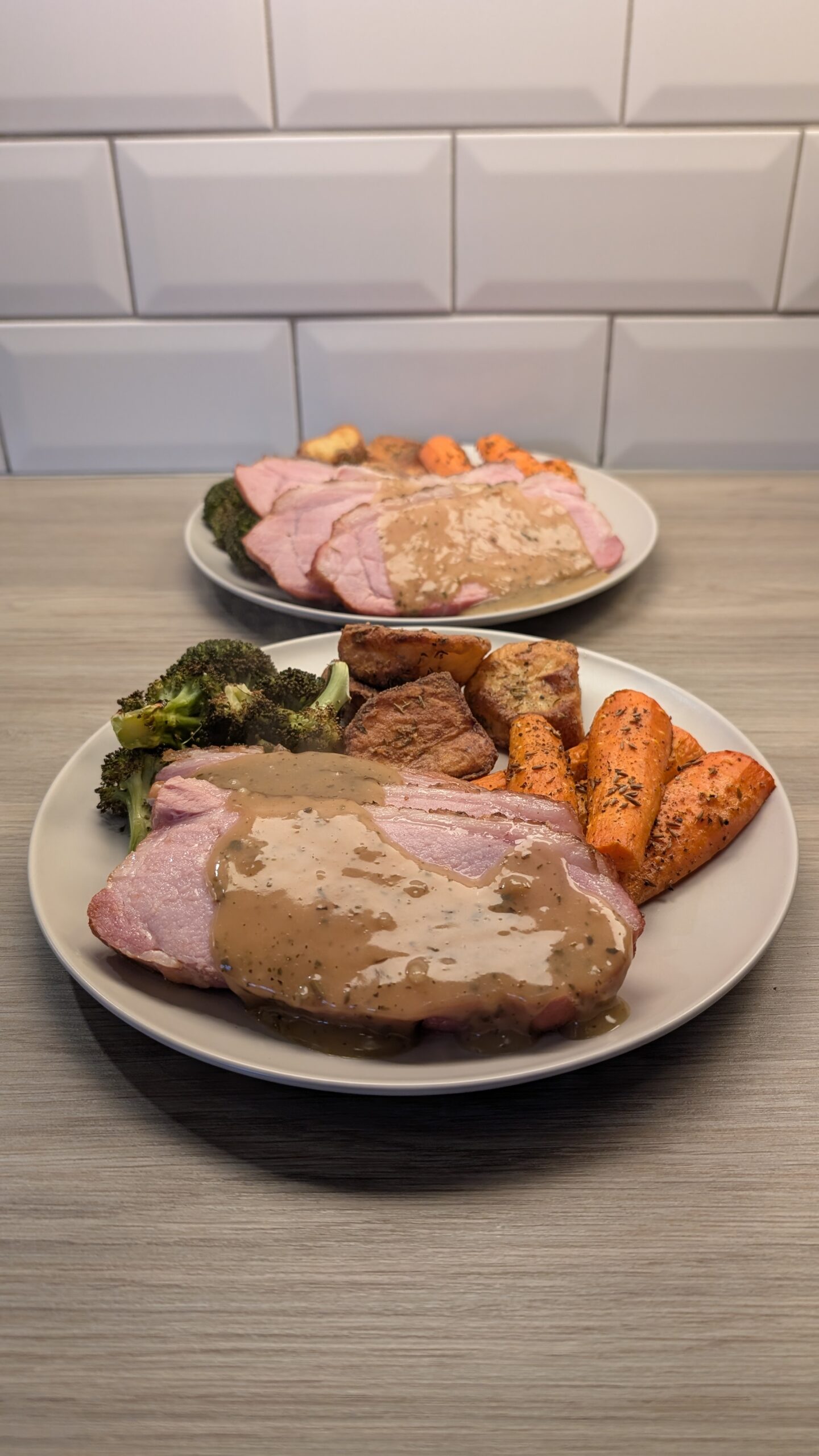 Bacon Loin, Garlic and Thyme Roast Potatoes, Sage Broccoli and Cumin Carrots with a Southern Style Gravy