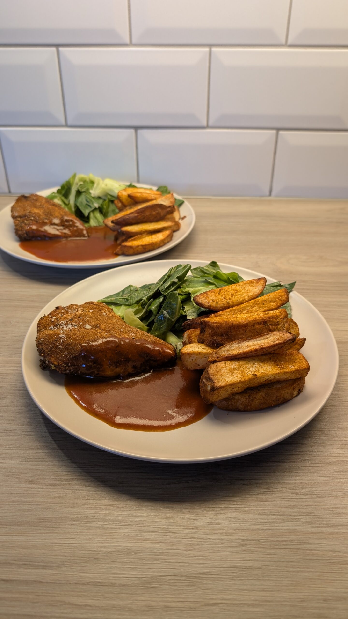 Cajun Rubbed Chicken Breast, Lightly Spiced Chips, Collared Greens and a Smokey Paprika Sauce
