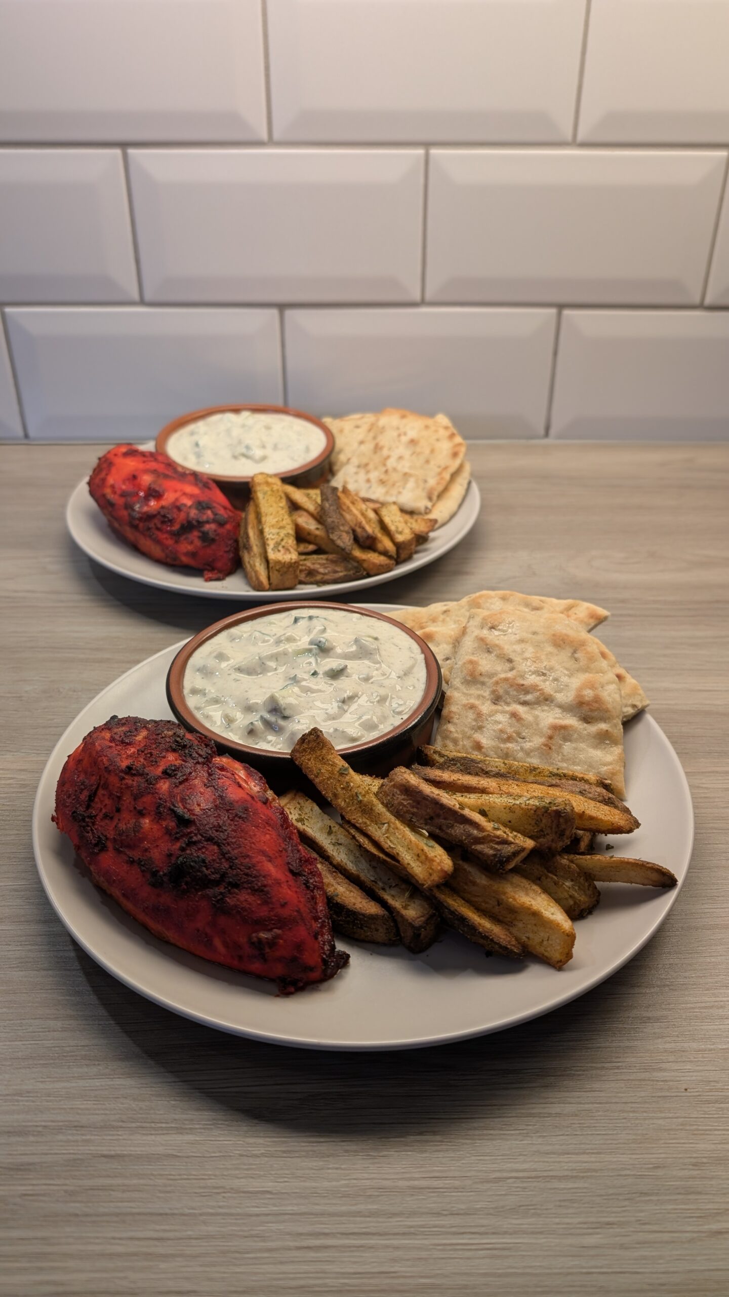 Tandoori Chicken, Curry and Fenugreek Spiced Fries, Cumin Roti and Raita