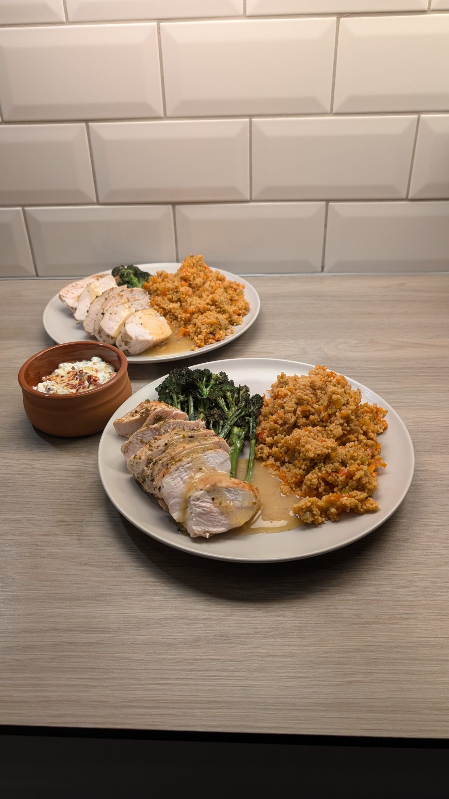 Chicken Breast Finished with a Lemon Pan Sauce, Vegetable Cous Cous, Purple Sprouting Broccoli and Whipped Feta with Honey