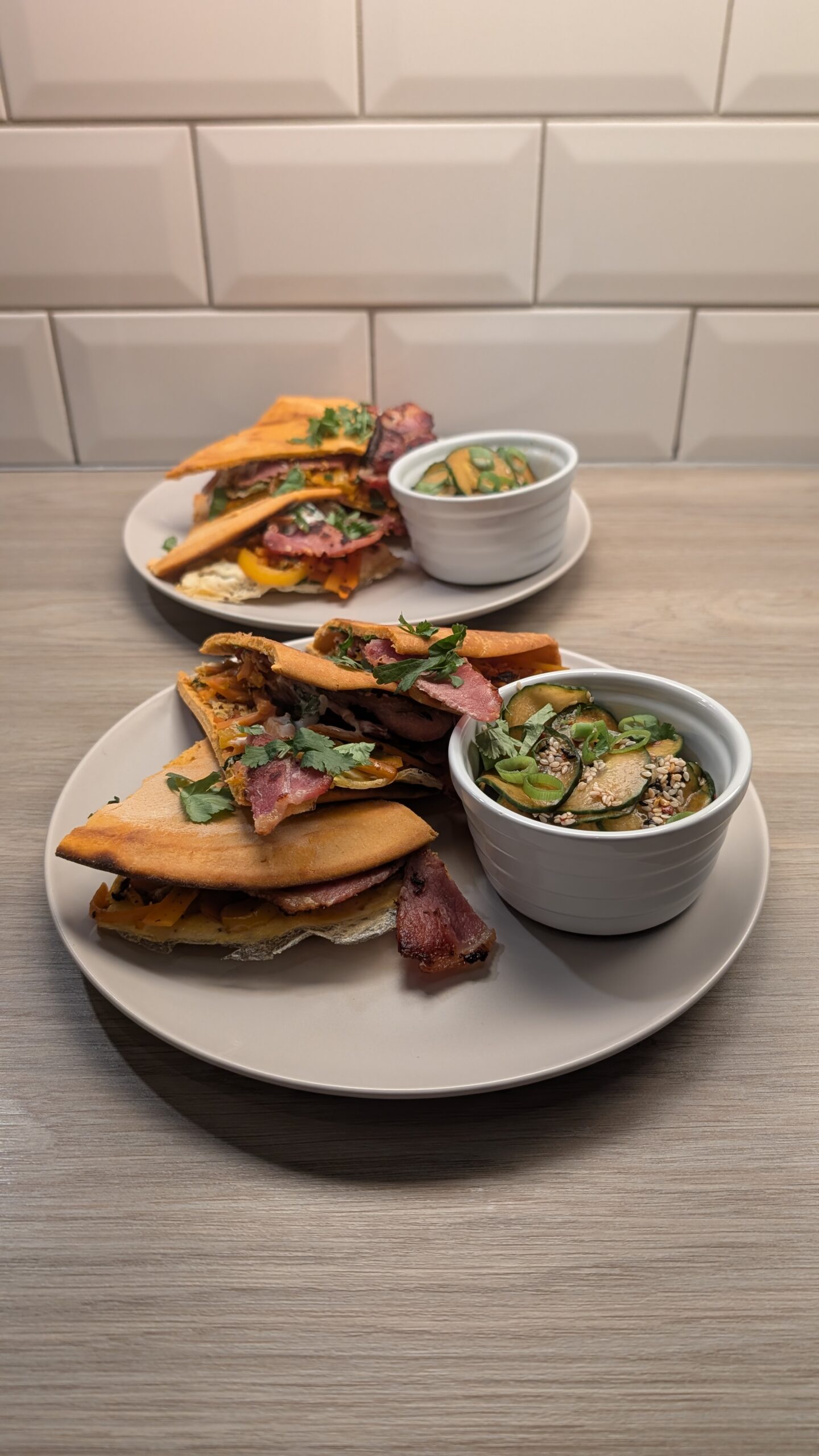 Gochujang Flavoured Flat Breads Filled with Bacon, Carrot, Egg and Pepper with Oi Muchum