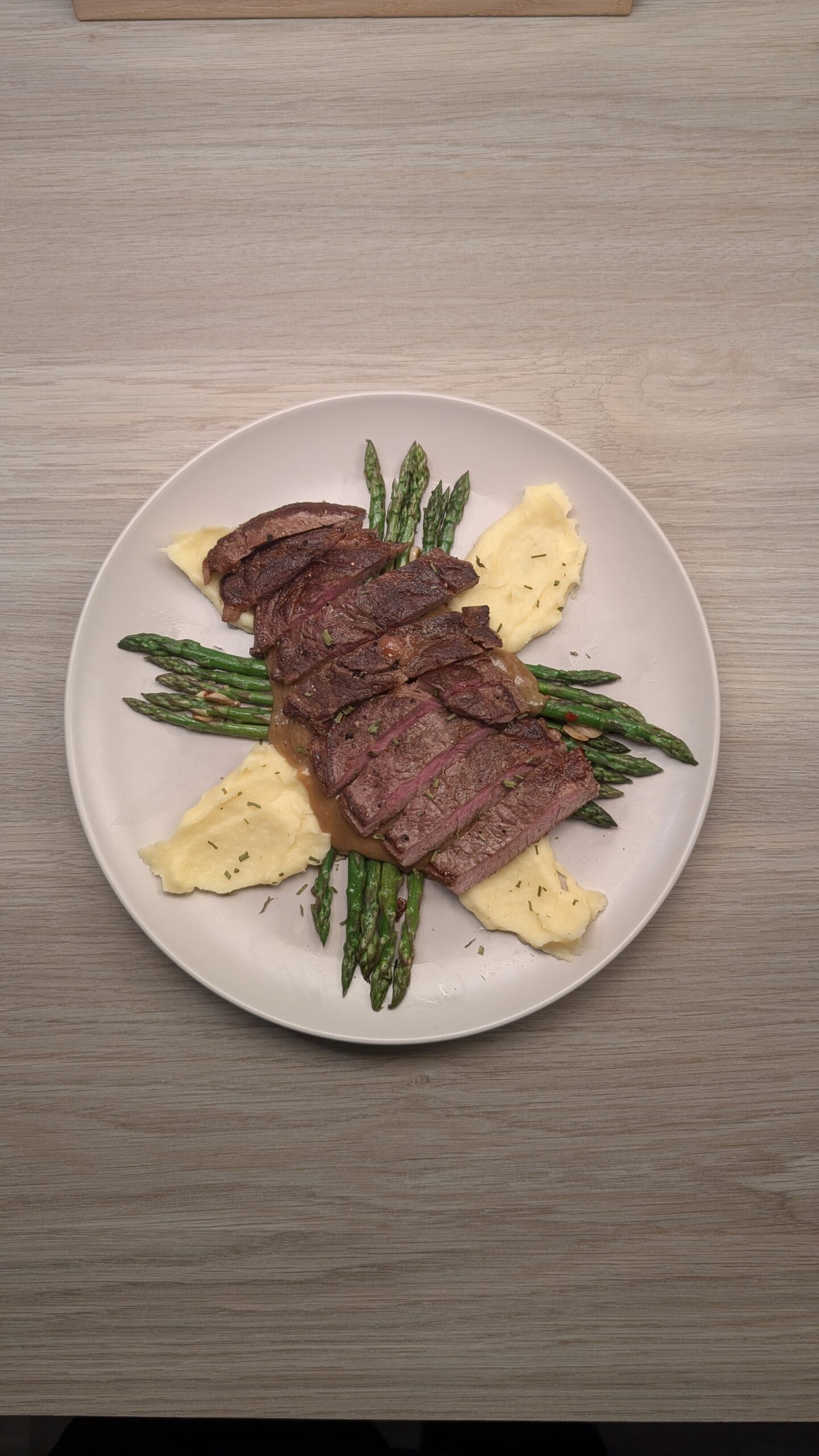 Rib Eye Steak, Parsnip Puree and Chilli and Garlic Asparagus with Velouté