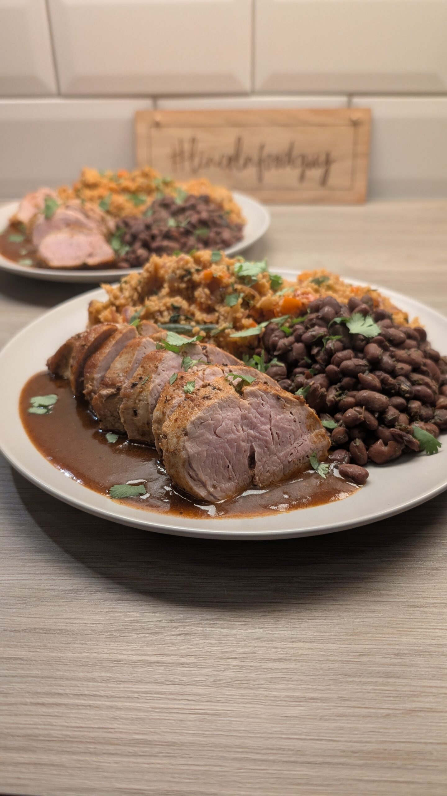 Pork Tenderloin Cooked in Paprika, Vegetable Cous Cous and Black Beans with a Lime and Paprika Sauce