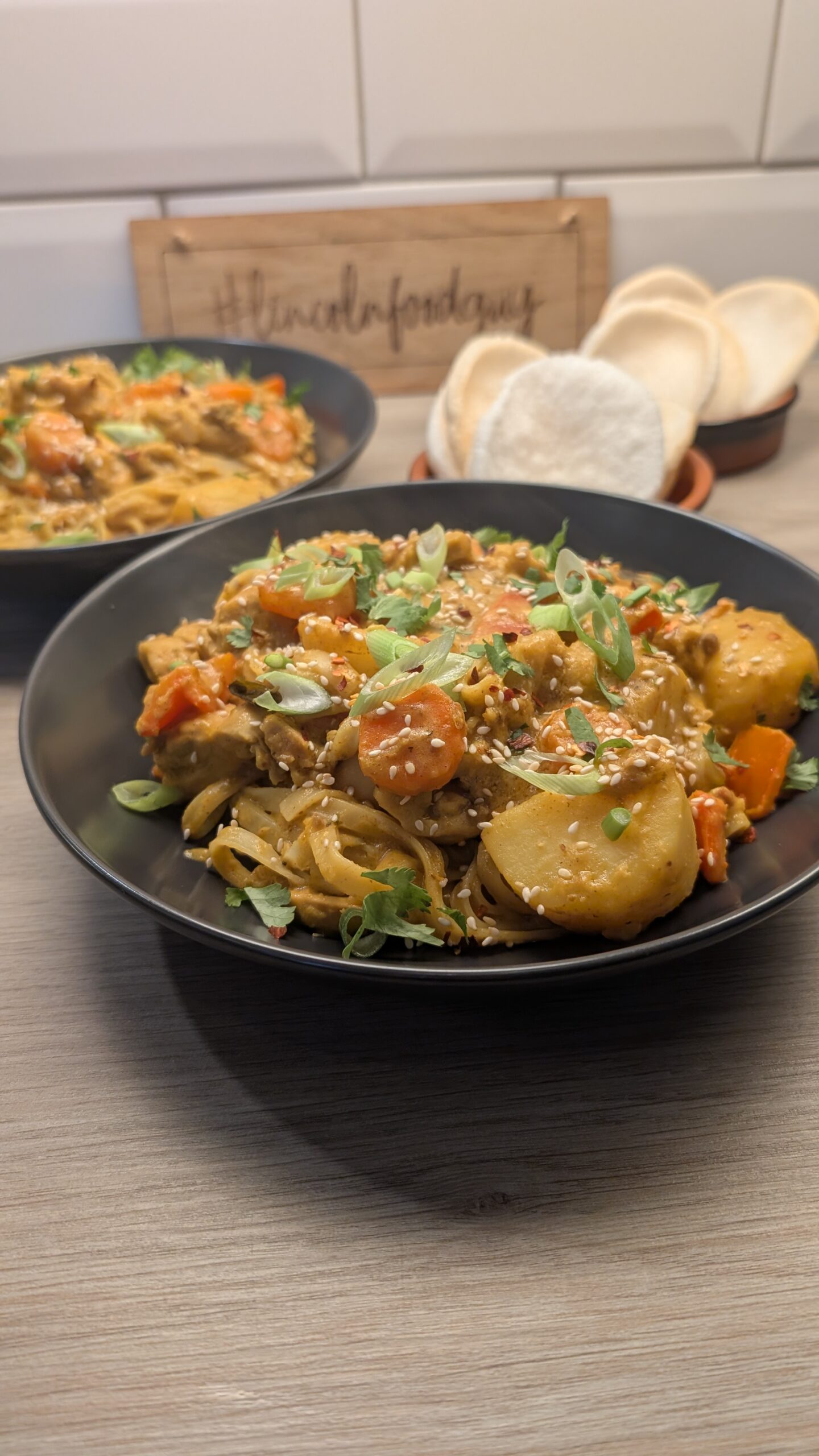 Chicken Massaman Noodles with Freshly Fried Prawn Crackers